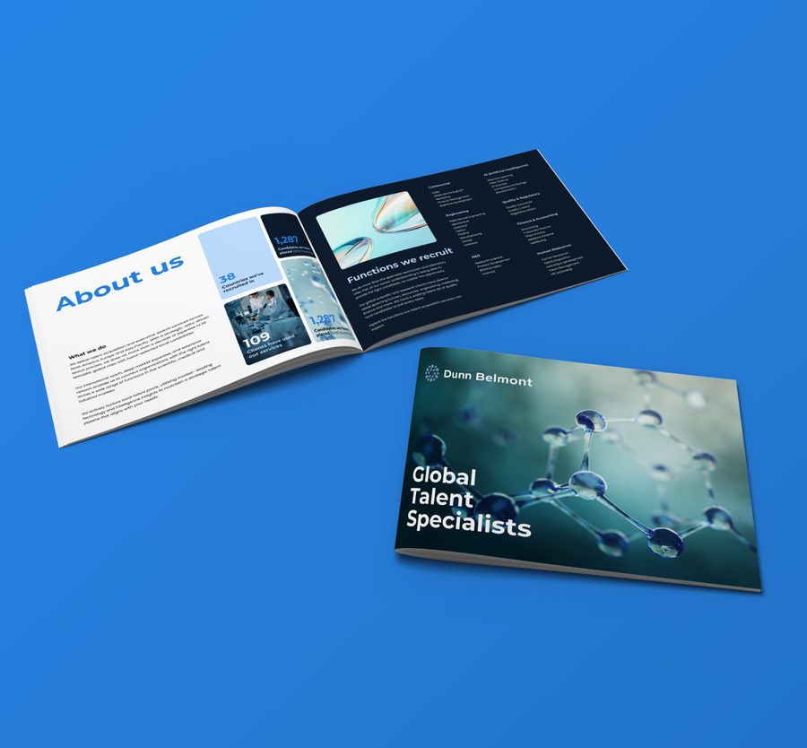 Two brochures displayed on a blue background: an open tri-fold leaflet showing "About us" and recruitment information, and a closed brochure titled "Global Talent Specialists" by Dunn Belmont featuring a molecular structure image.