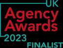 A badge design featuring the text "Agency Awards 2023 FINALIST" in bold red and teal letters with a modern, framed layout.