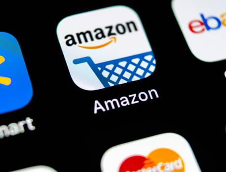 Amazon app icon featuring a blue shopping cart on a white background with the word "Amazon" below.