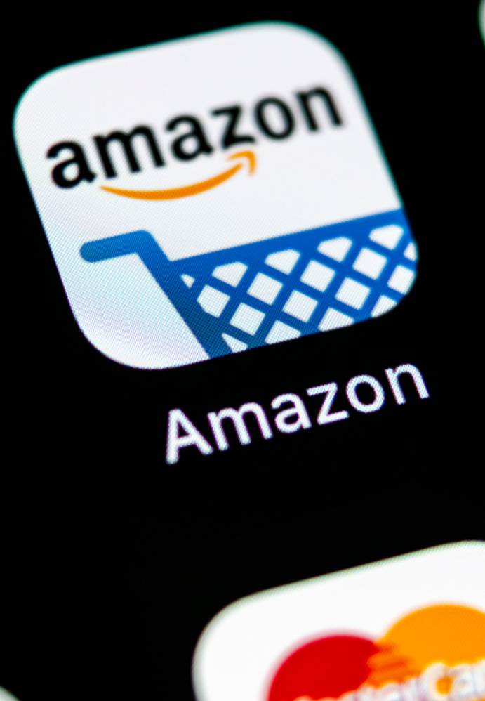 Amazon app icon featuring a blue shopping cart on a white background with the word "Amazon" below.