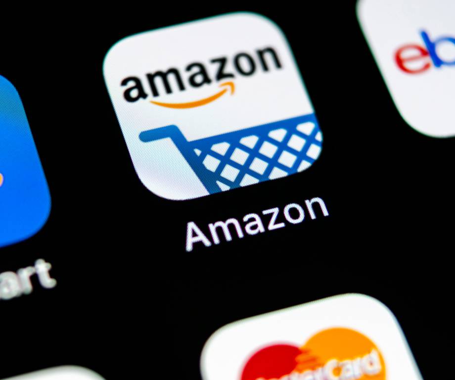 Amazon app icon featuring a blue shopping cart on a white background with the word "Amazon" below.