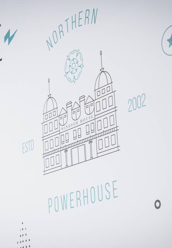 Line drawing of a historic building labeled "Windsor House" with "ESTD 2002," surrounded by decorative icons and text in shades of blue and black on a white background.