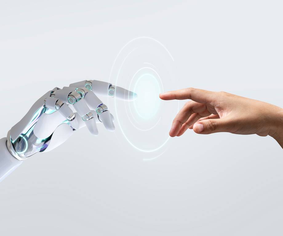 Human hand reaching out to touch a robotic hand, with a digital target or interface between them. Minimalist background emphasizing the interaction.
