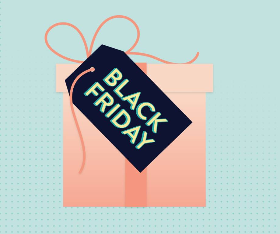 A pink gift box with a ribbon and a tag reading "Black Friday" against a light blue background.