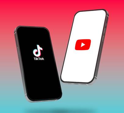 Two smartphones float against a red-to-teal gradient: the left shows the TikTok logo on black, the right shows the YouTube logo on white.