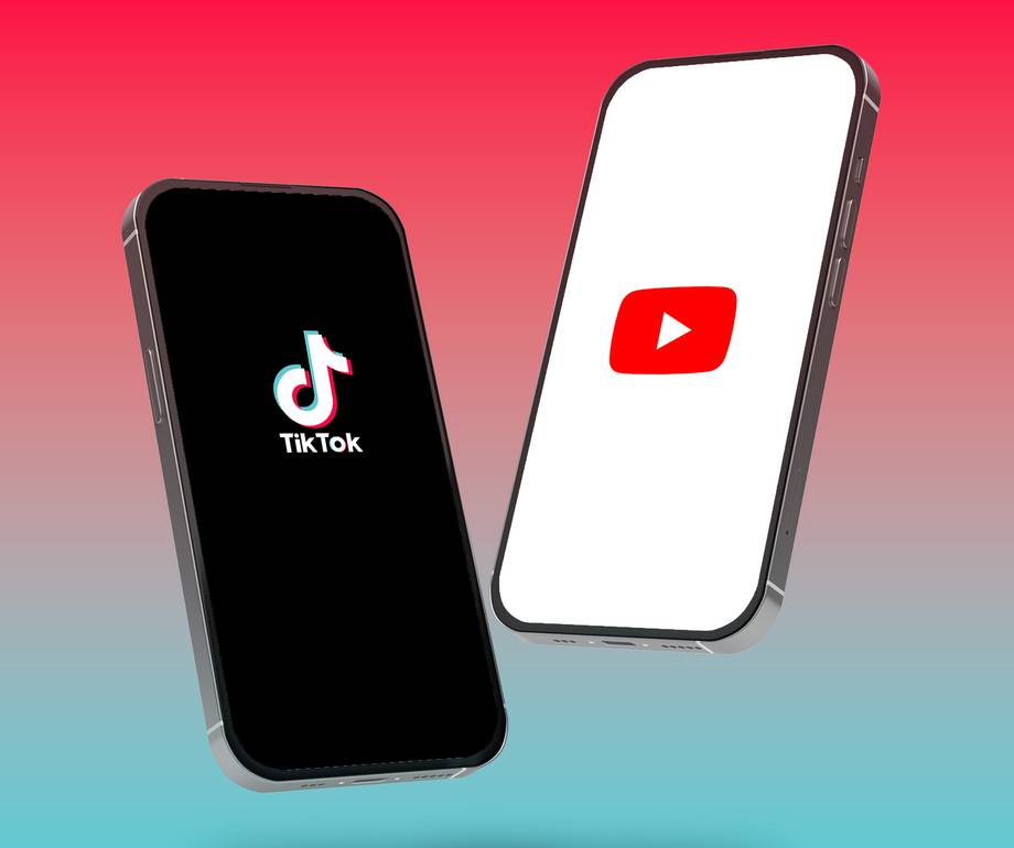 Two smartphones displaying TikTok and YouTube logos against a gradient pink and blue background.
