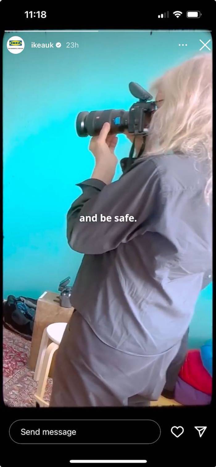 Instagram story from IKEA UK showing a person with long light hair and a grey jacket filming with a camera against a teal wall, with overlaid text reading 'and be safe.'