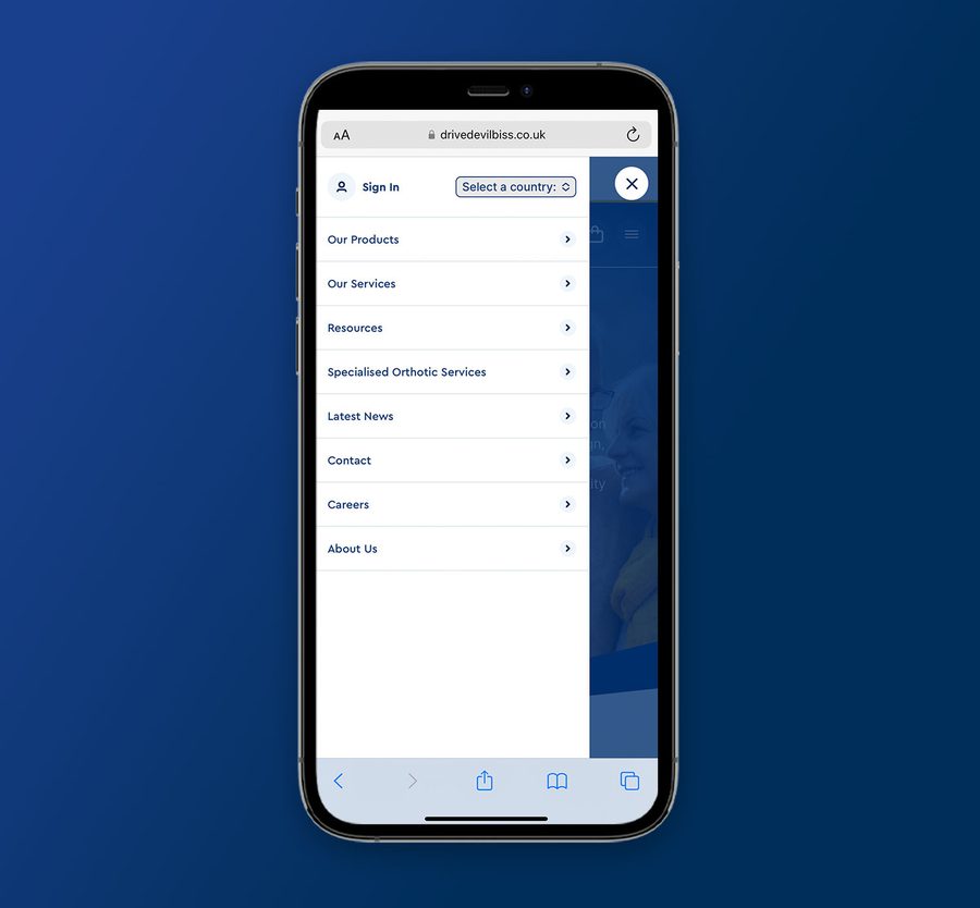 Smartphone displaying a website menu on a blue background.