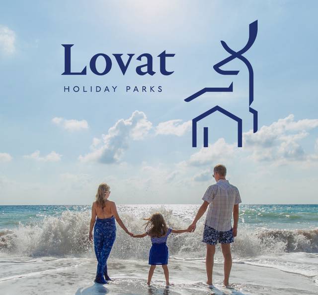 A family of three holding hands at the beach, facing the ocean, with the sky and clouds above and a blue and white logo in the sky.