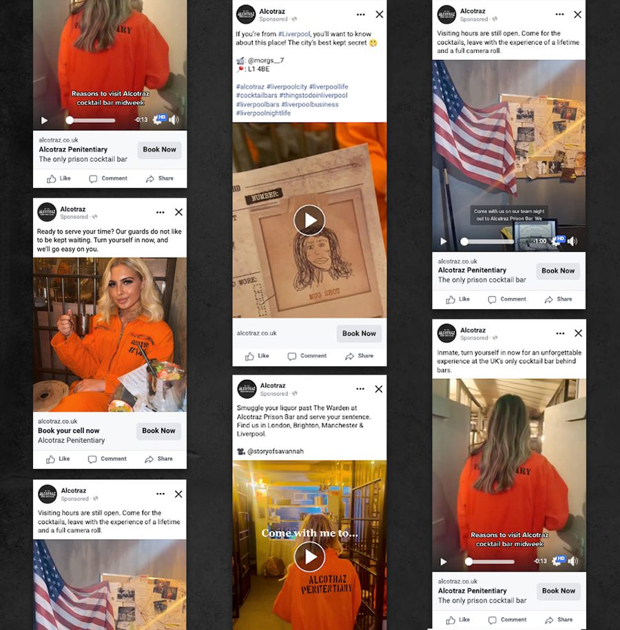 Person in an orange prison uniform with "Alcotraz Penitentiary" written on the back, sitting at a table inside a themed bar environment.