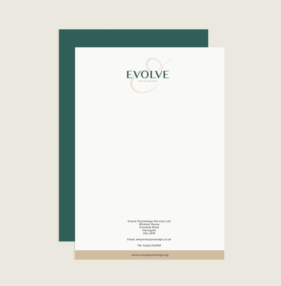 Front view of a white letterhead paper with "Evolve Psychology" logo at the top, on an off-white background, with contact details at the bottom.