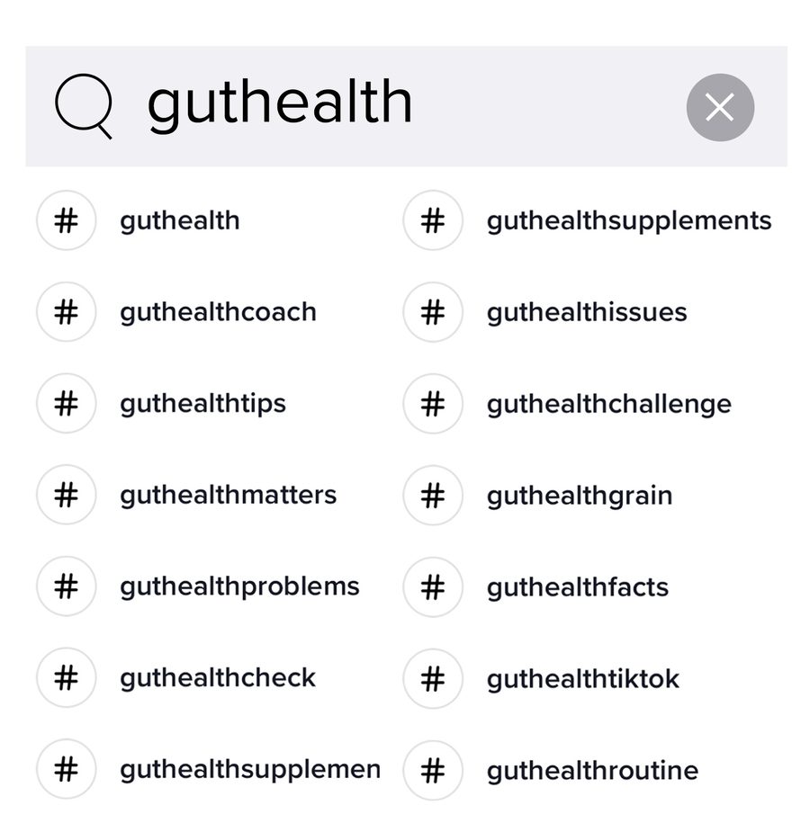 A search results page showing hashtags related to gut health, including 'guthealth', 'guthealthsupplements', and 'guthealthcoach'.