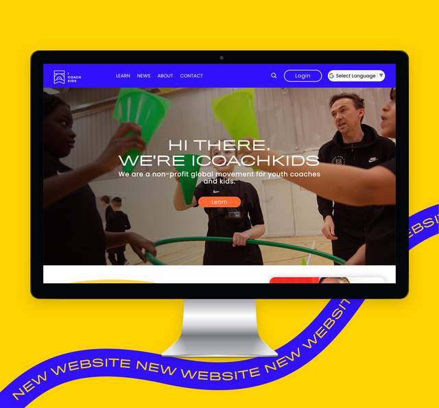 A computer screen displaying the homepage of a non-profit youth coaching website, with children and coach engaging in an activity, set against a yellow background with a "new website" banner.