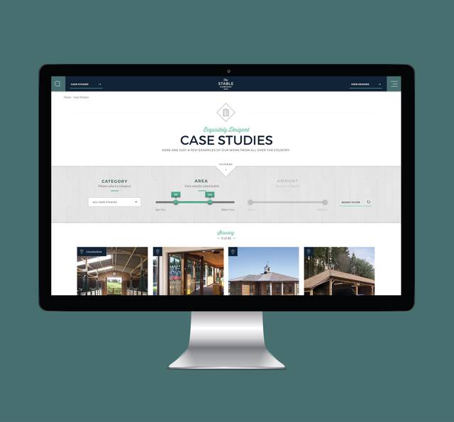 A computer monitor displaying a website for case studies with filters and thumbnail images of various buildings on a dark teal background.
