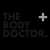 The logo features bold black text reading "THE BODY DOCTOR" with a grey plus sign above and to the right.