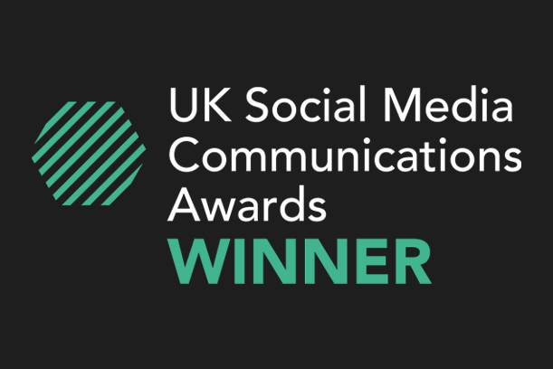UK Social Media Communications Awards logo with the word "WINNER" below on a black background.
