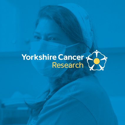 A female scientist wearing a mask looking to the side, with Yorkshire Cancer Research logo overlayed on a blue background.